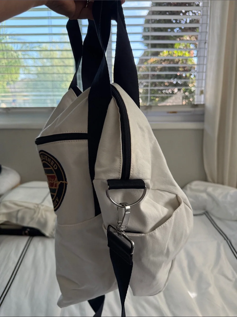 Tommy Hilfiger White Canvas Duffel with Black Straps and Signature Patch